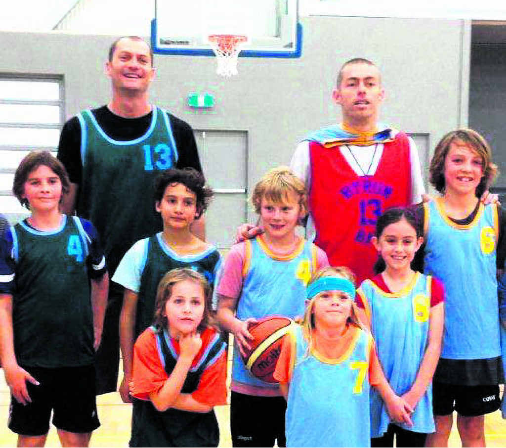 EXPERT GUIDANCE: Nash Campbell and Matt Ogle with some keen young players. EXPERT GUIDANCE: Nash Campbell and Matt Ogle with some keen young players.